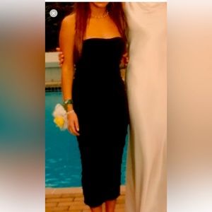 Dolce Gabbanna black dress. Sleeveless or you can use straps.